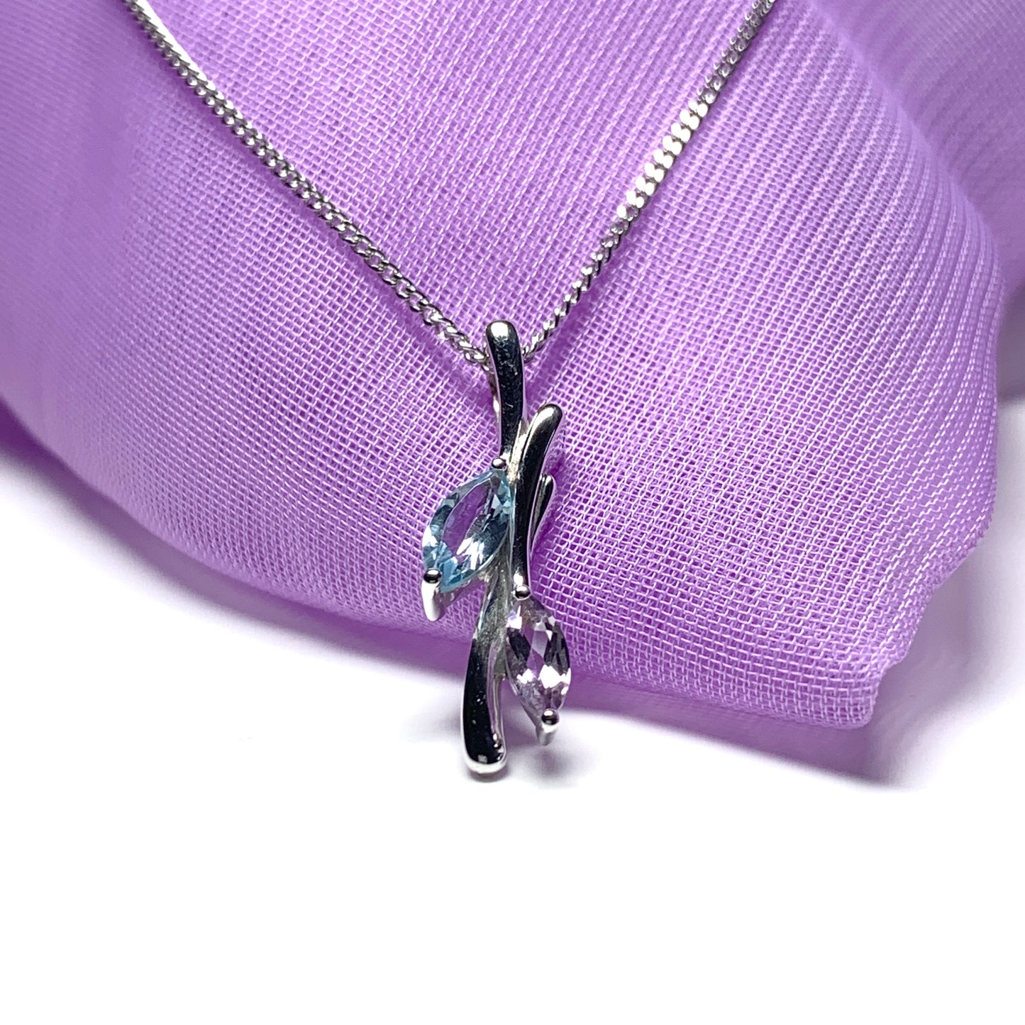 Amethyst and blue topaz swirl necklace pendant