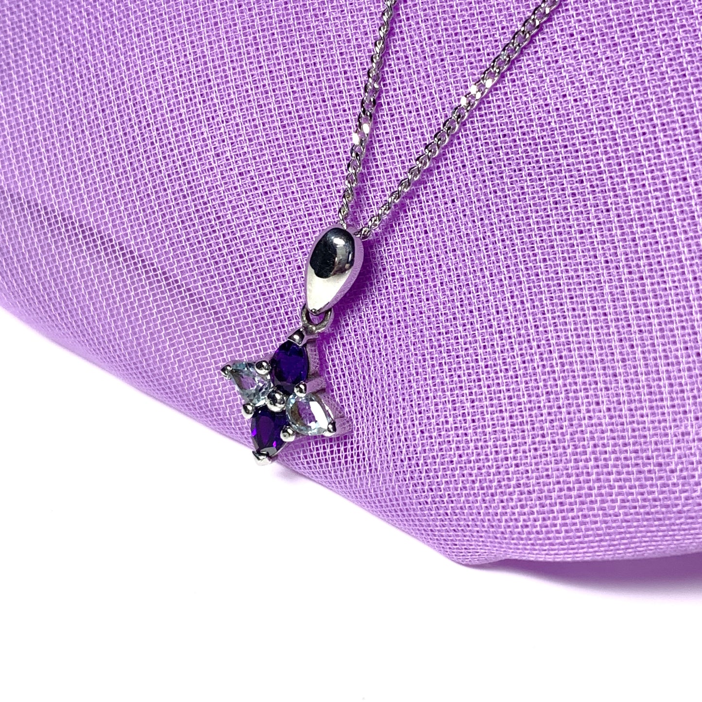 Amethyst and blue topaz necklace pendant]