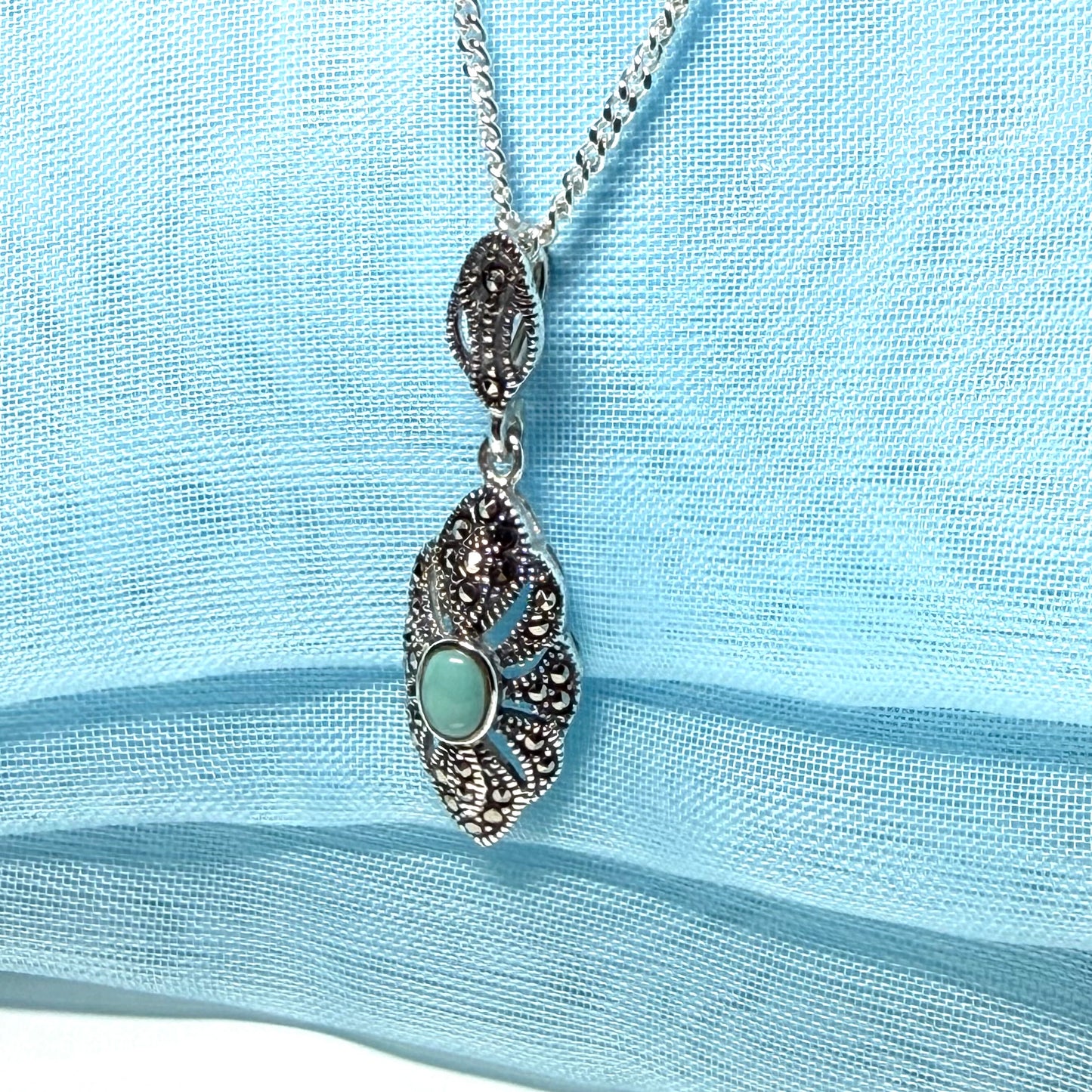Oval turquoise and marcasite drop sterling silver necklace pendant