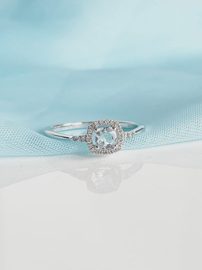 Real aquamarine ring and diamond white gold square cluster