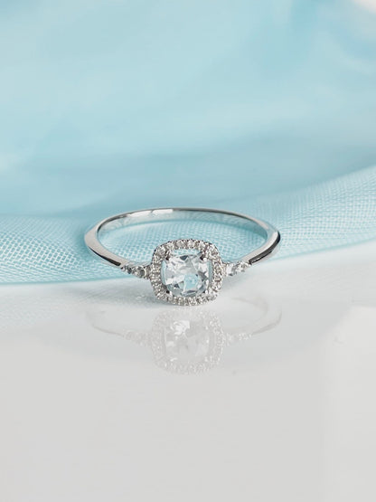 Real aquamarine ring and diamond white gold square cluster