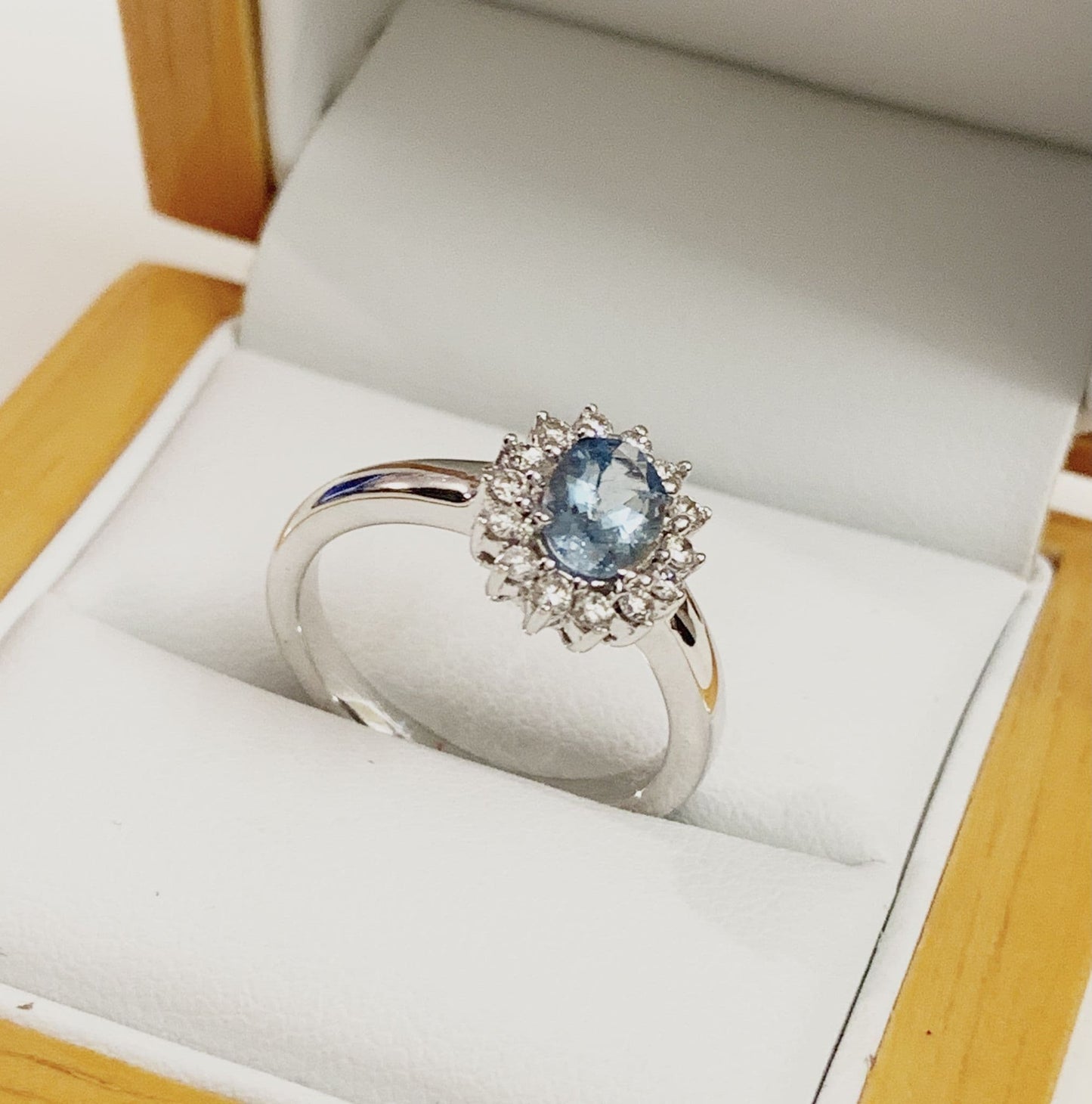 Aquamarine white gold oval and diamond cluster ring