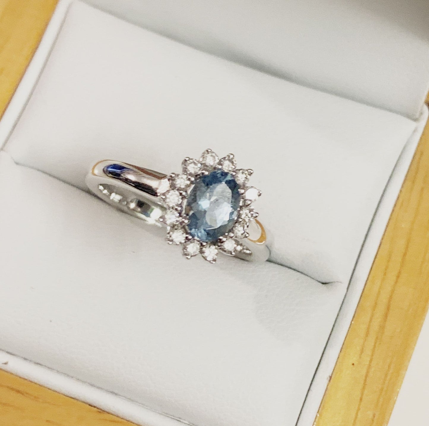 Aquamarine white gold oval and diamond cluster ring