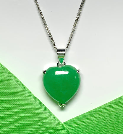 A real green jade necklace heart shape sterling silver pendant including chain