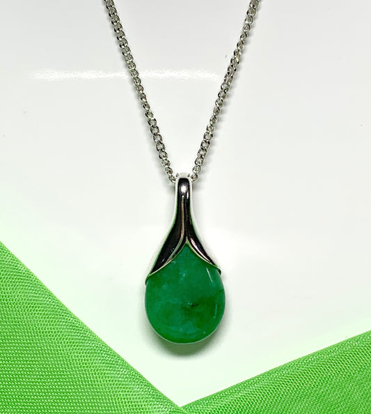 A real green jade necklace in a tear drop or pear shape pendant