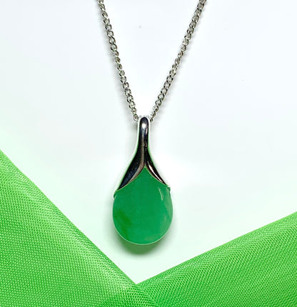 A real green jade necklace in a teardrop shaped or pear shape