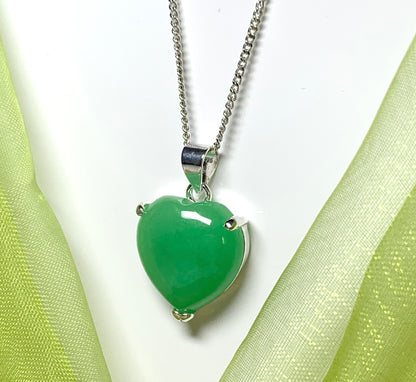 A really stunning real green jade necklace heart shaped sterling silver pendant