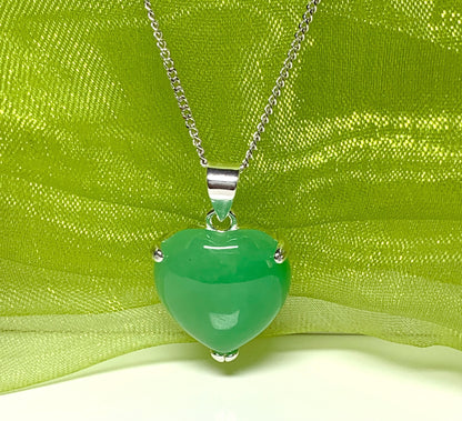 A really stunning real green jade necklace heart shaped sterling silver pendant