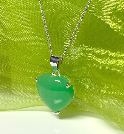 A really stunning real green jade necklace heart shaped sterling silver pendant