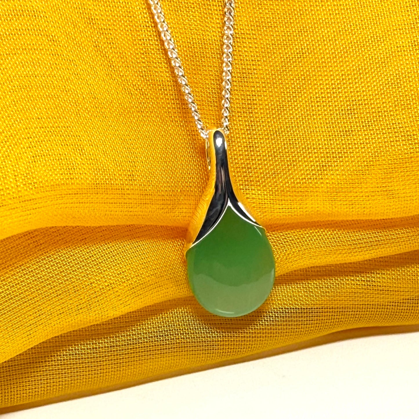 Beautiful and stunning real green jade pendant necklace in a teardrop shape, exquisite and timeless design