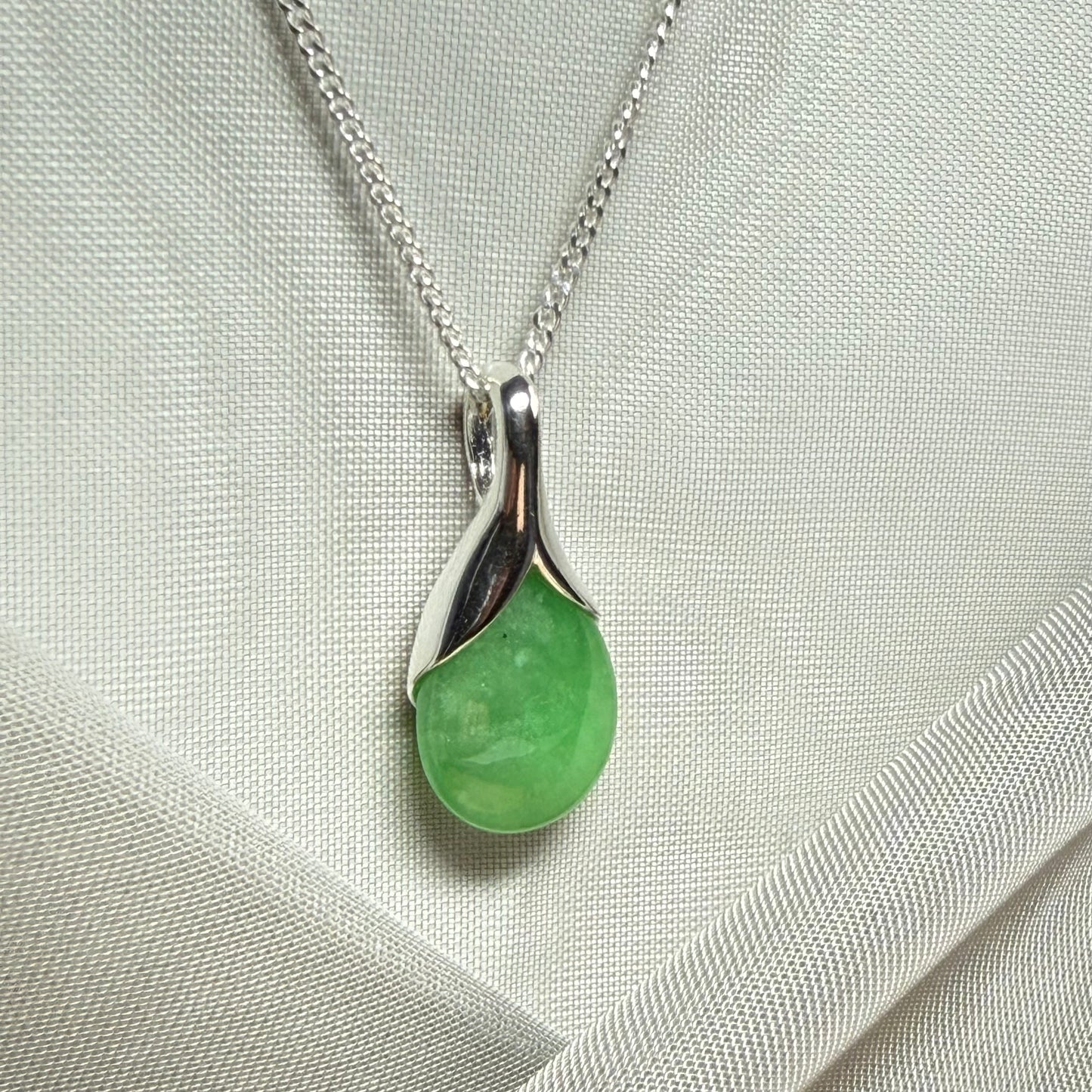 Beautiful and stunning real green jade pendant necklace in a teardrop shape, exquisite and timeless design