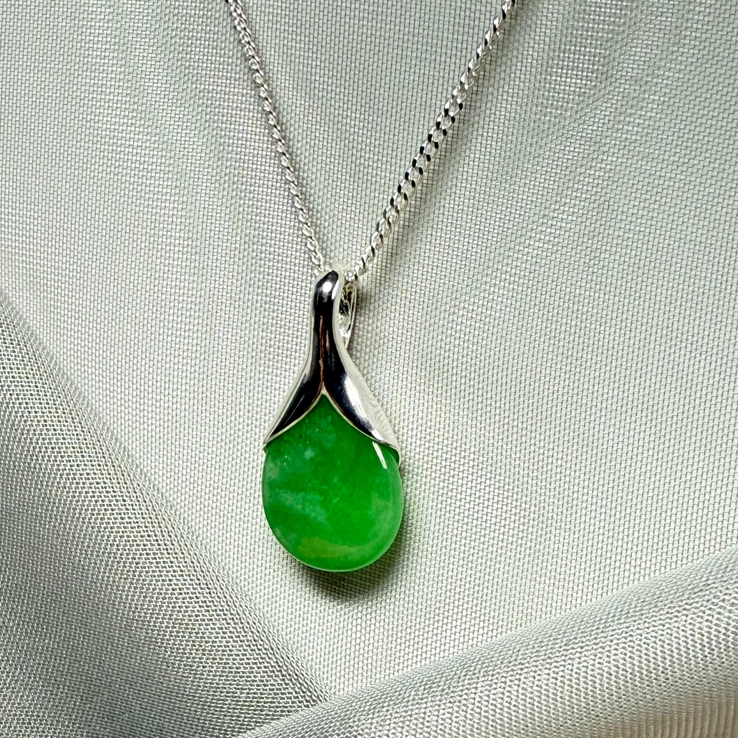 Beautiful and stunning real green jade pendant necklace in a teardrop shape, exquisite and timeless design