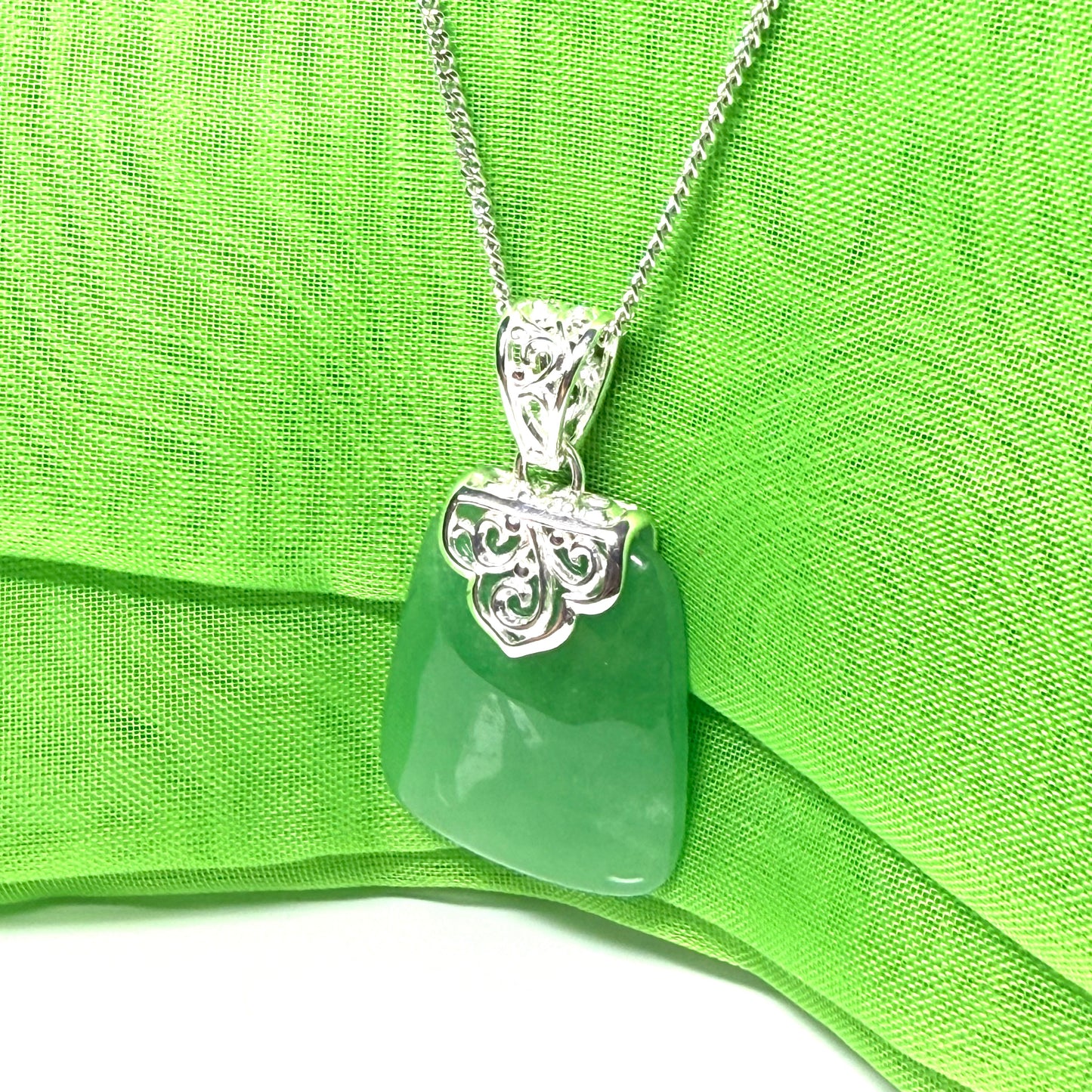 Beautiful and timeless real green jade necklace large cushion shaped with a chain