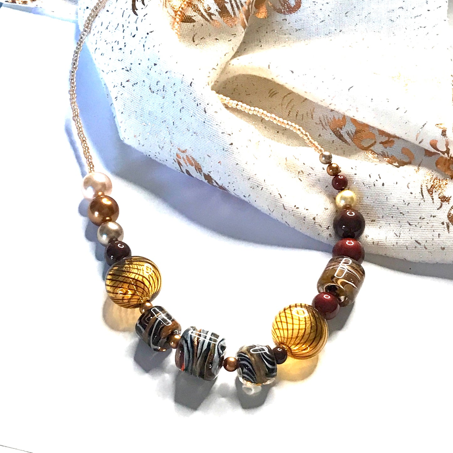 Beautiful brown, white, golden and black beaded real Murano glass necklace