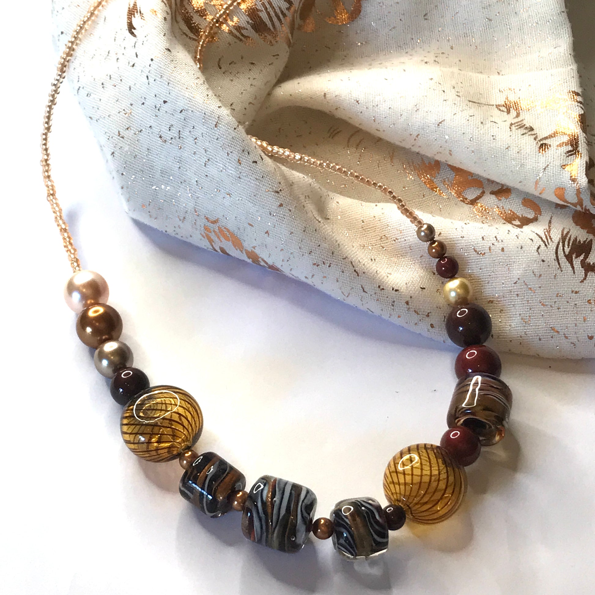 Beautiful brown, white, golden and black beaded real Murano glass necklace