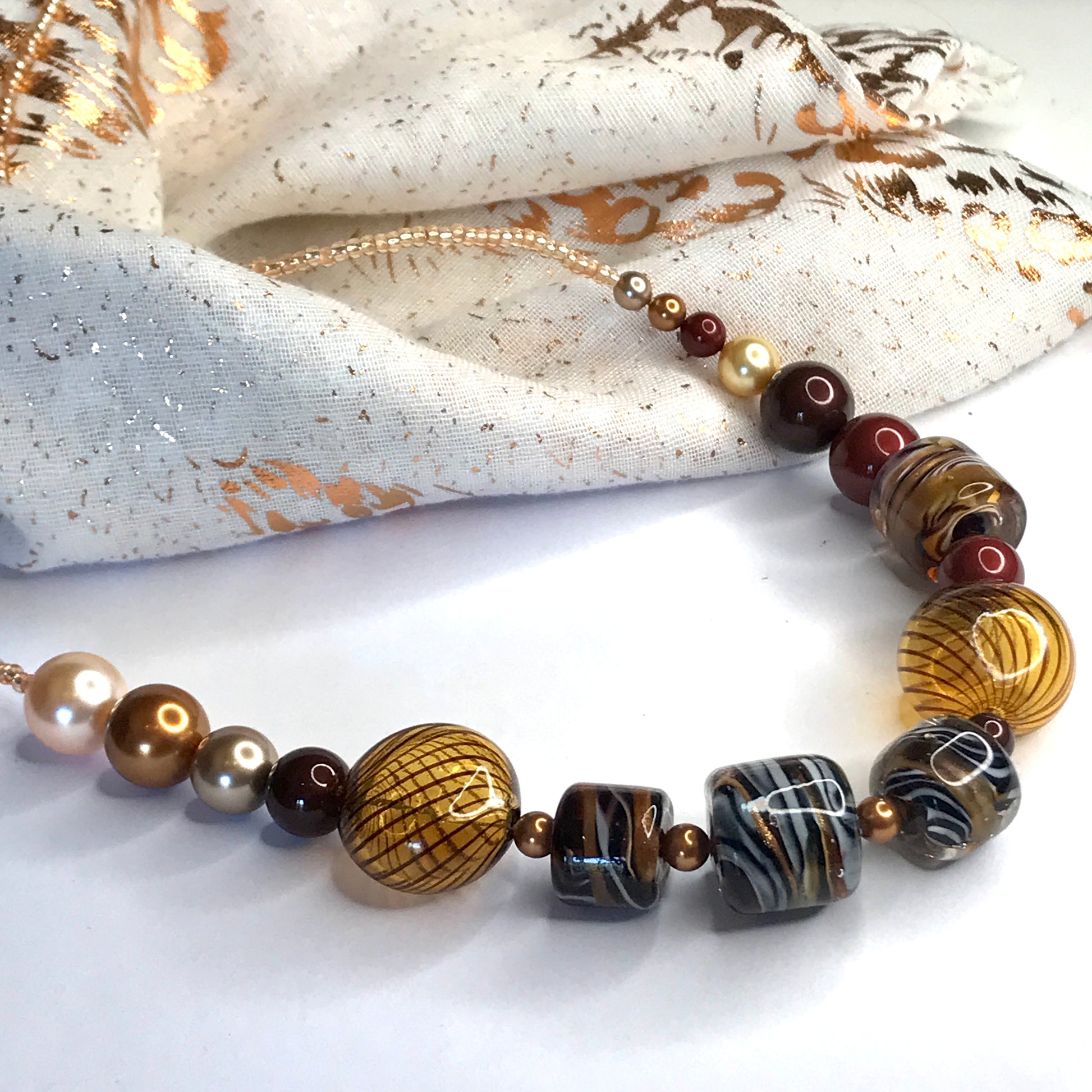 Beautiful brown, white, golden and black beaded real Murano glass necklace