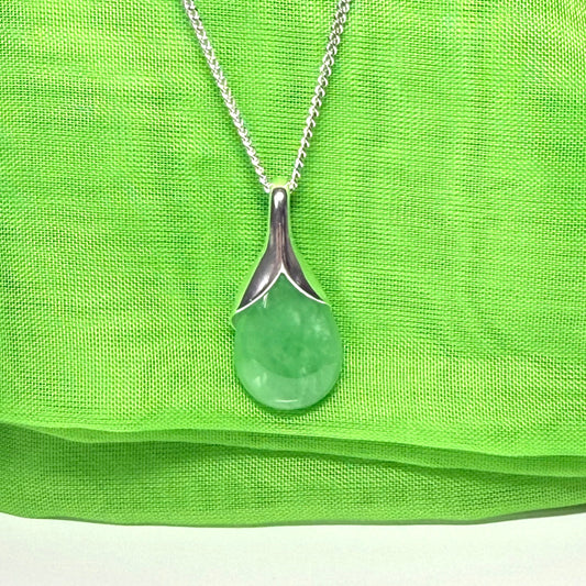 A beautiful real green jade necklace teardrop pendant pear shaped