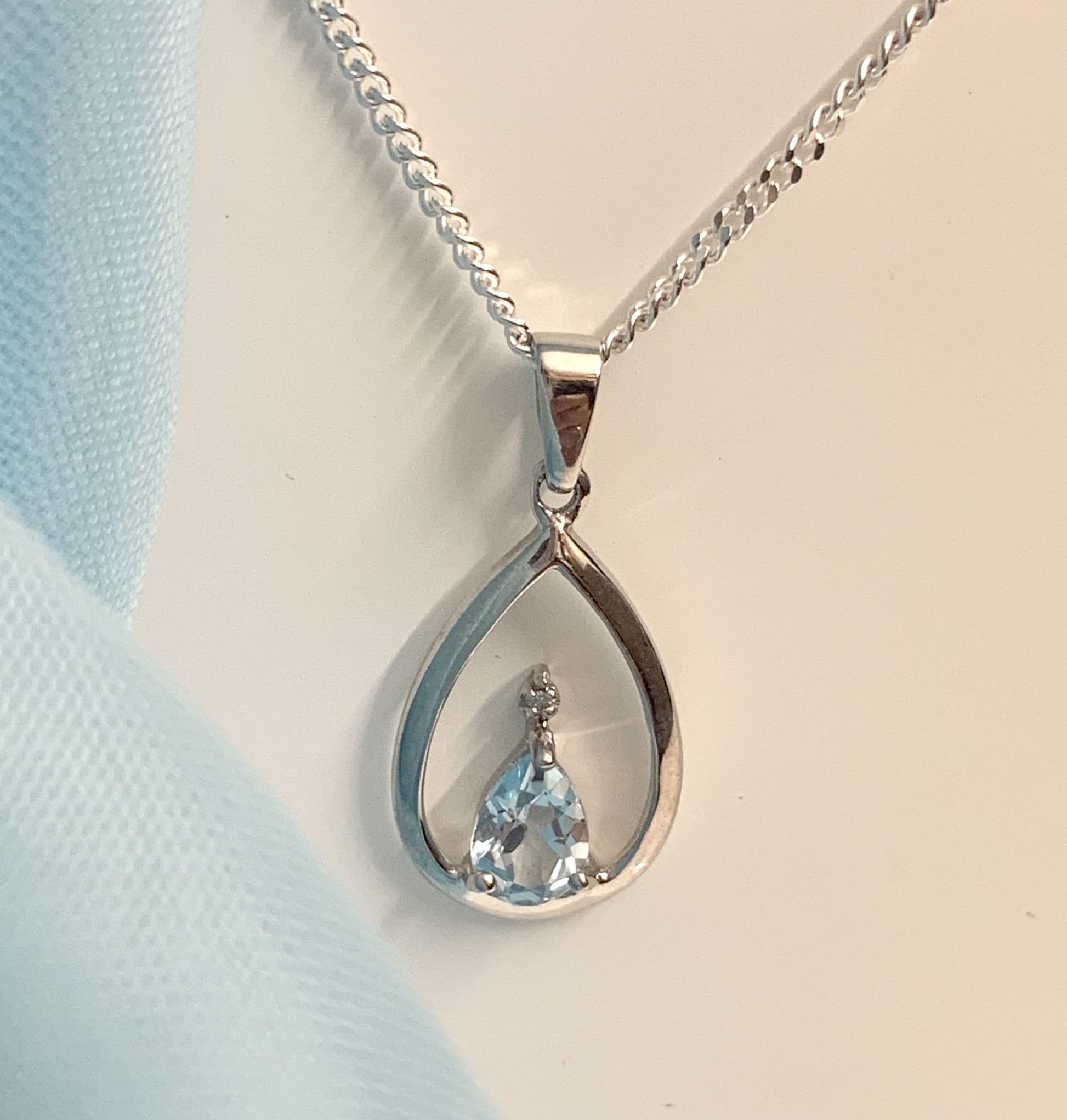 Blue Topaz Pear Shaped Sterling Silver Diamond Set Necklace Pendant