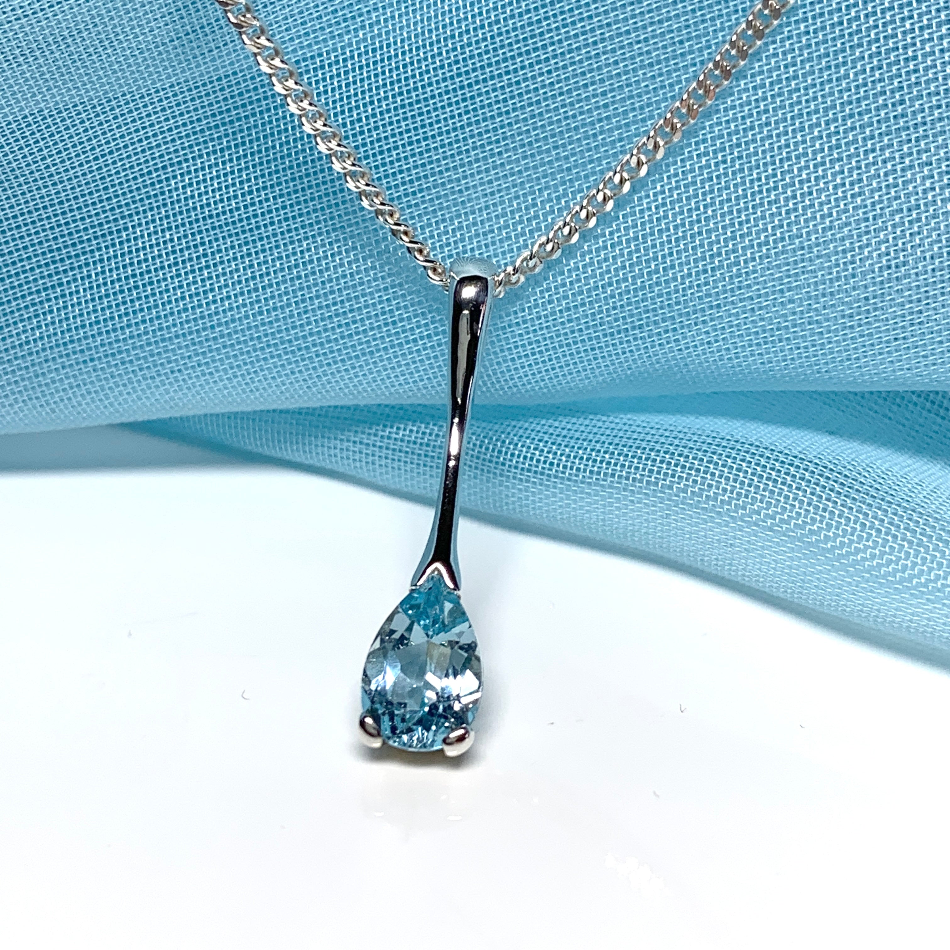 Silver blue hot sale topaz necklace