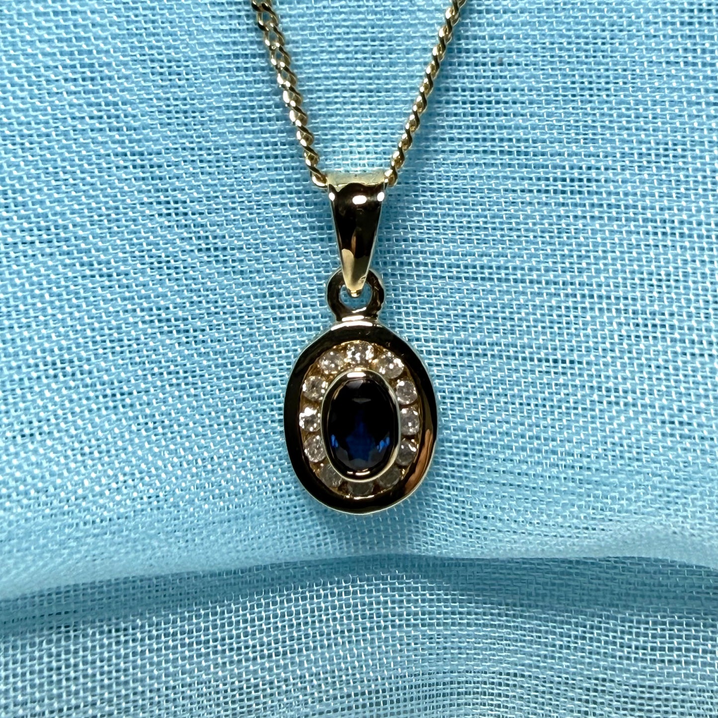 Blue real dark blue sapphire and diamond necklace yellow gold oval shaped cluster pendant