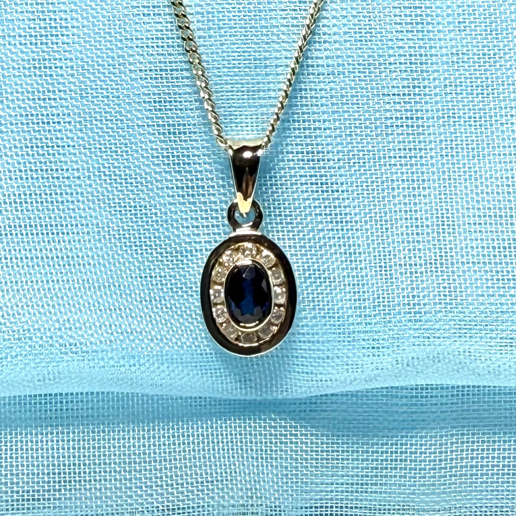 Blue real dark blue sapphire and diamond necklace yellow gold oval shaped cluster pendant