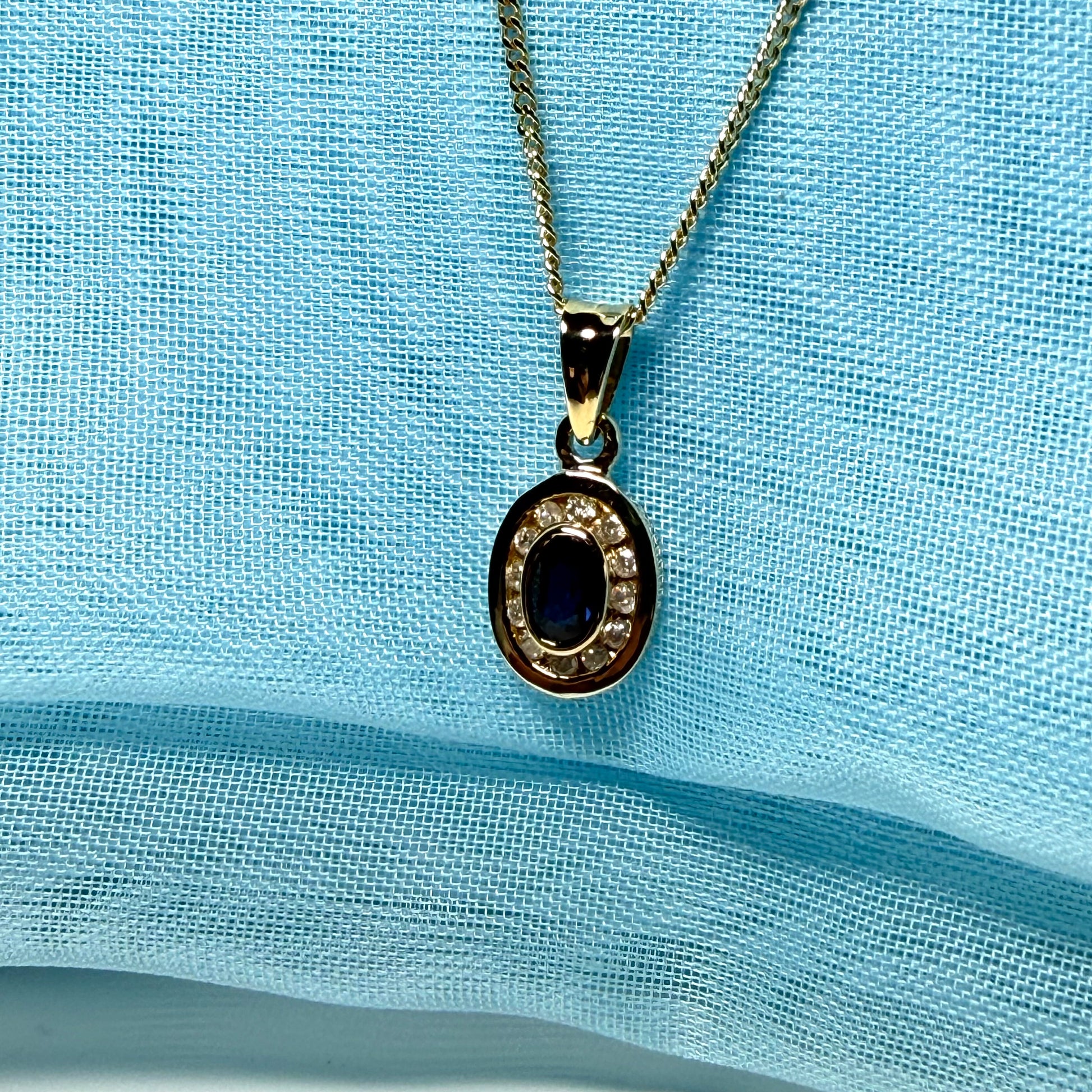 Blue real dark blue sapphire and diamond necklace yellow gold oval shaped cluster pendant