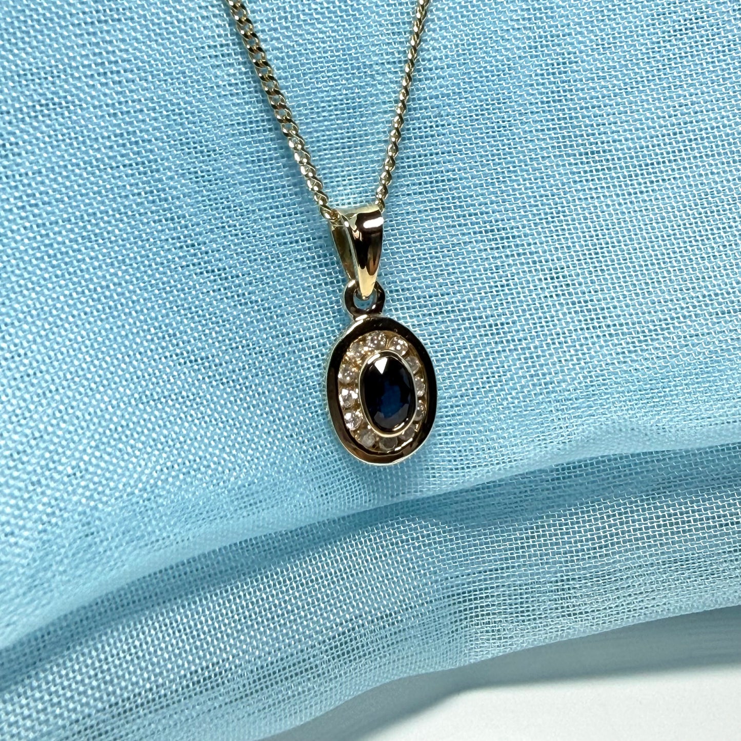 Blue real dark blue sapphire and diamond necklace yellow gold oval shaped cluster pendant