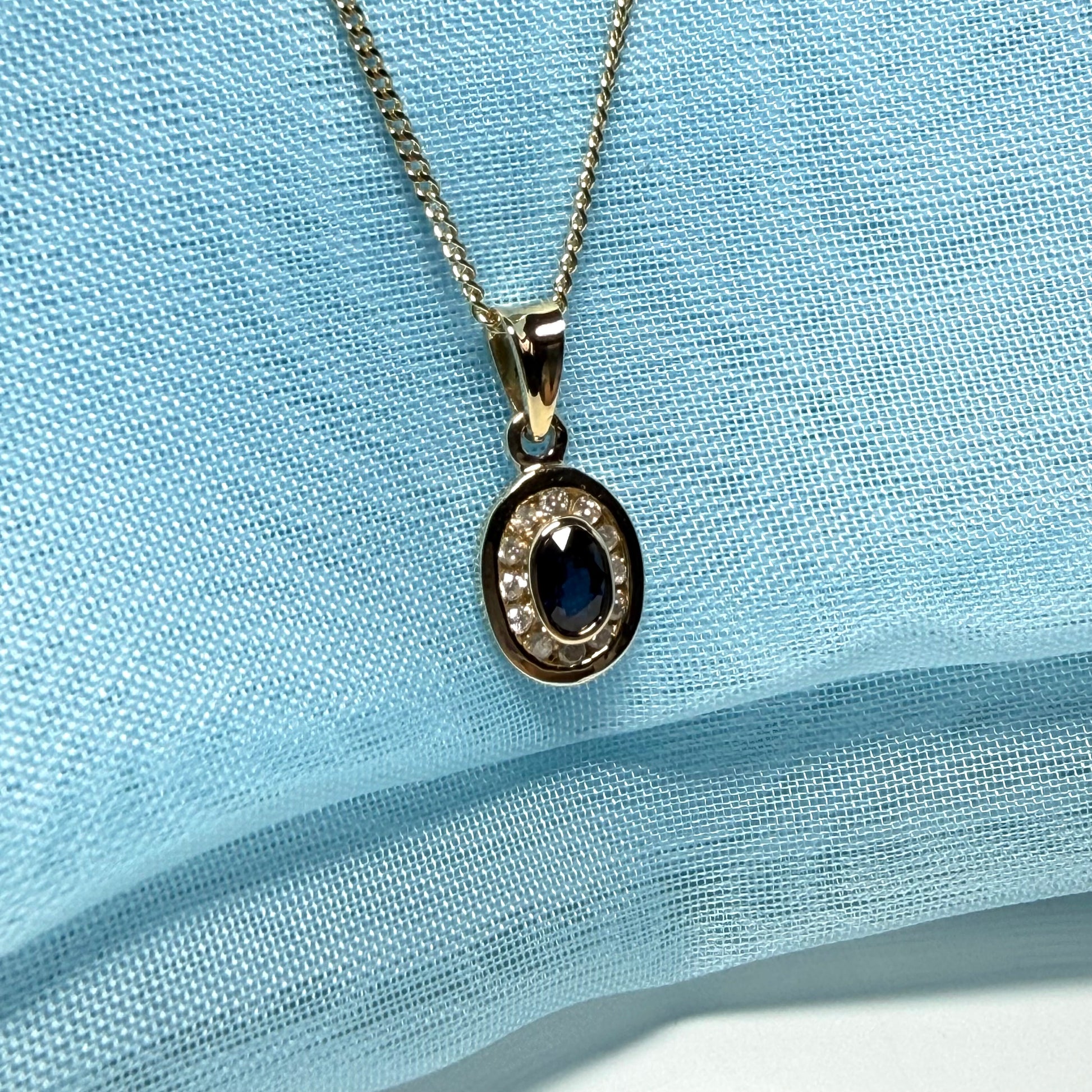 Blue real dark blue sapphire and diamond necklace yellow gold oval shaped cluster pendant