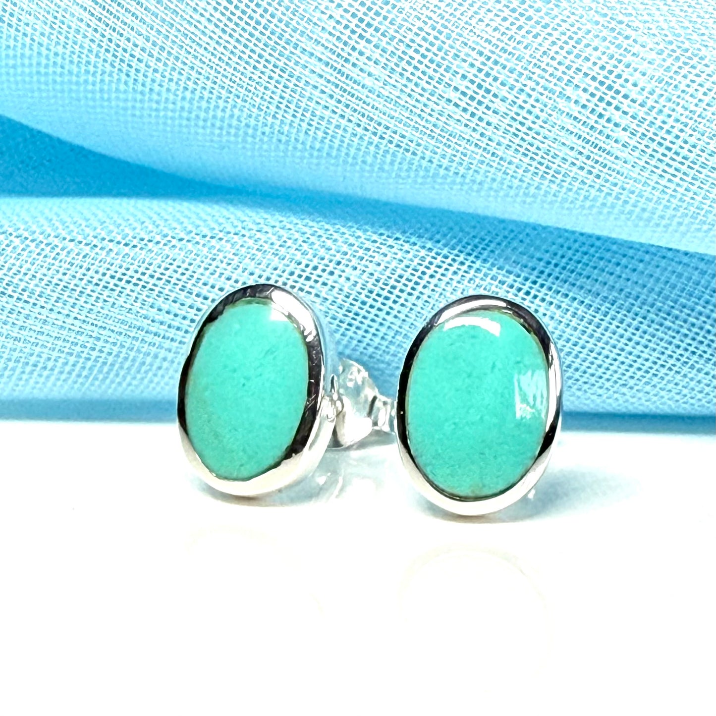 Blue sterling silver turquoise stud oval shaped earrings