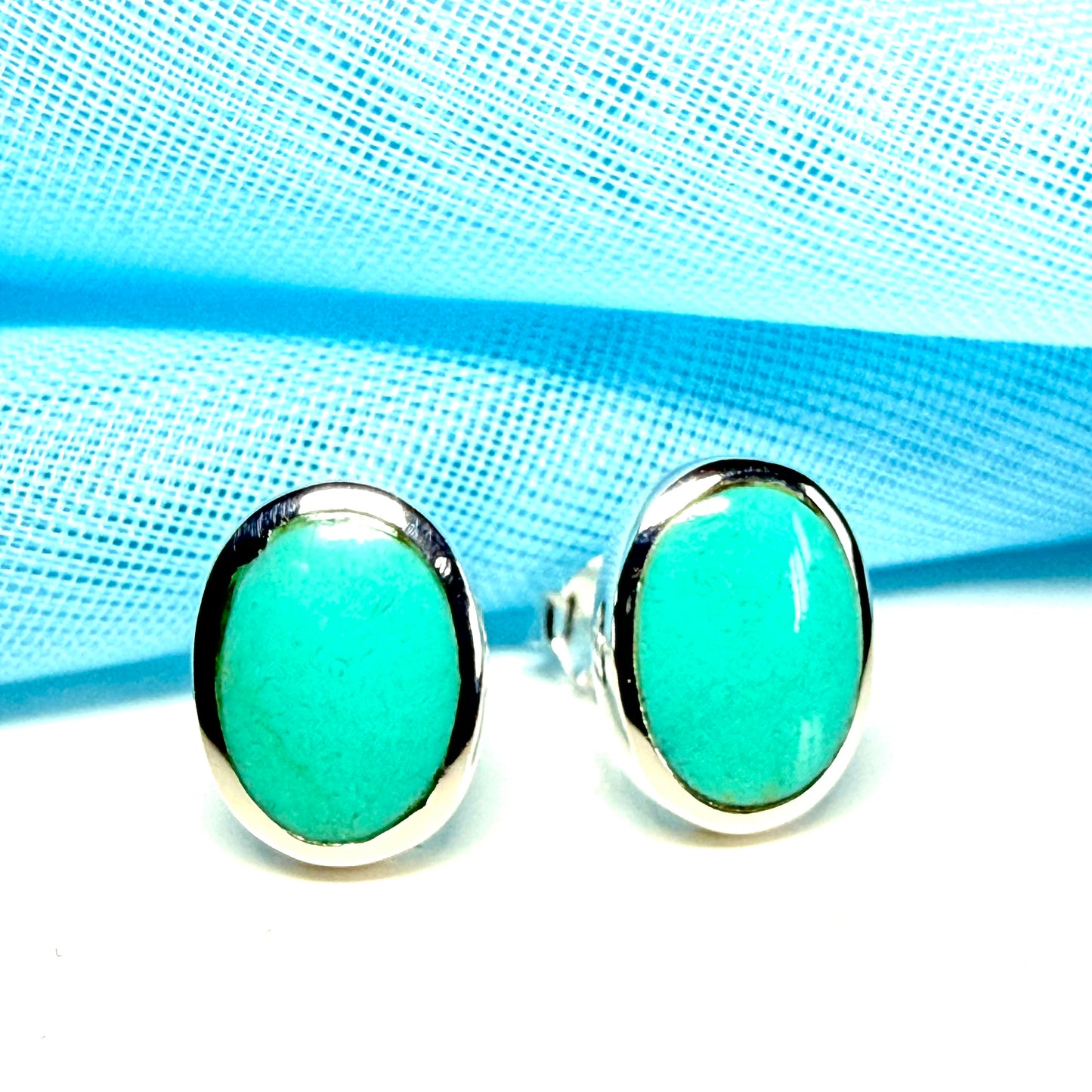 Blue sterling silver turquoise stud oval shaped earrings