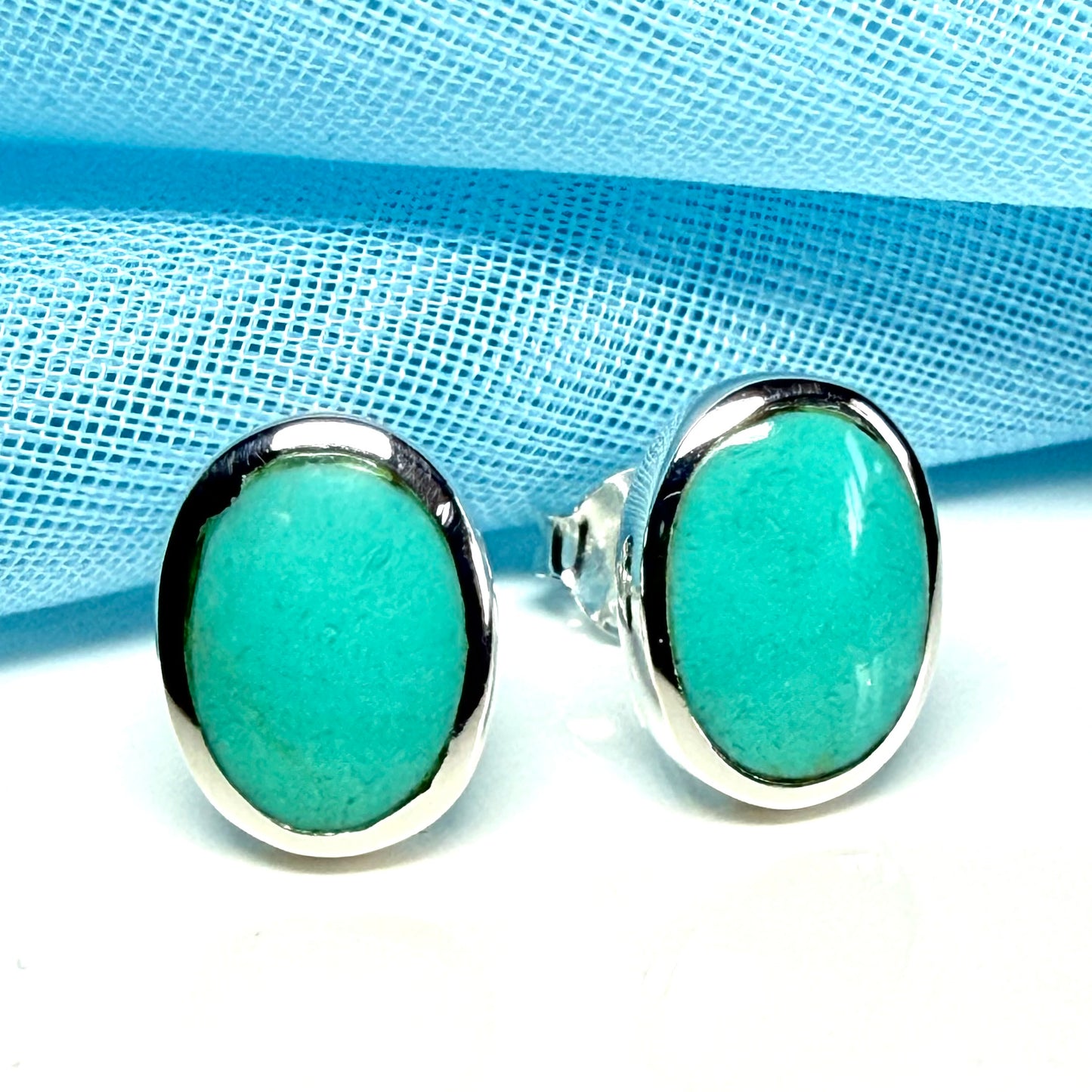 Blue sterling silver turquoise stud oval shaped earrings