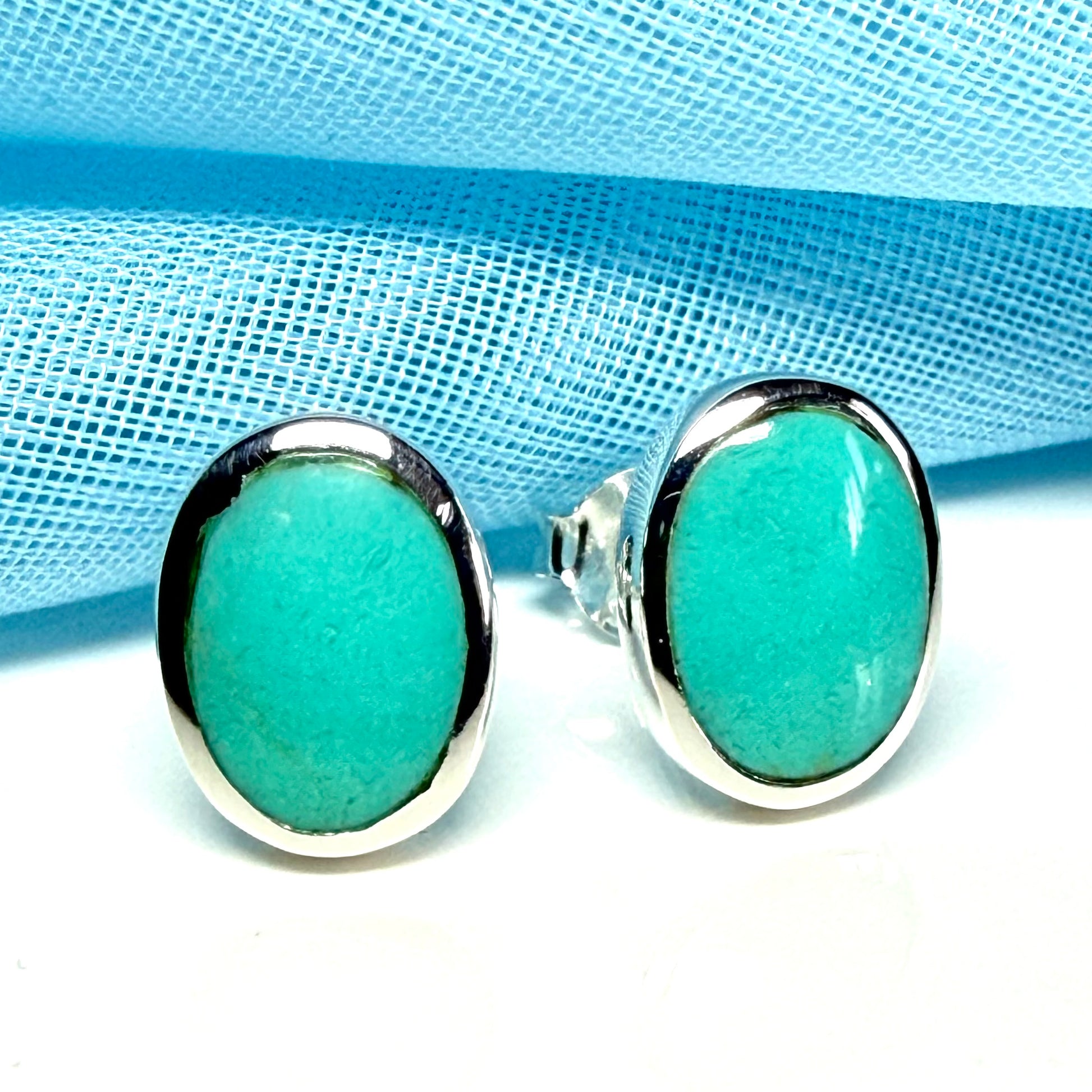 Blue sterling silver turquoise stud oval shaped earrings