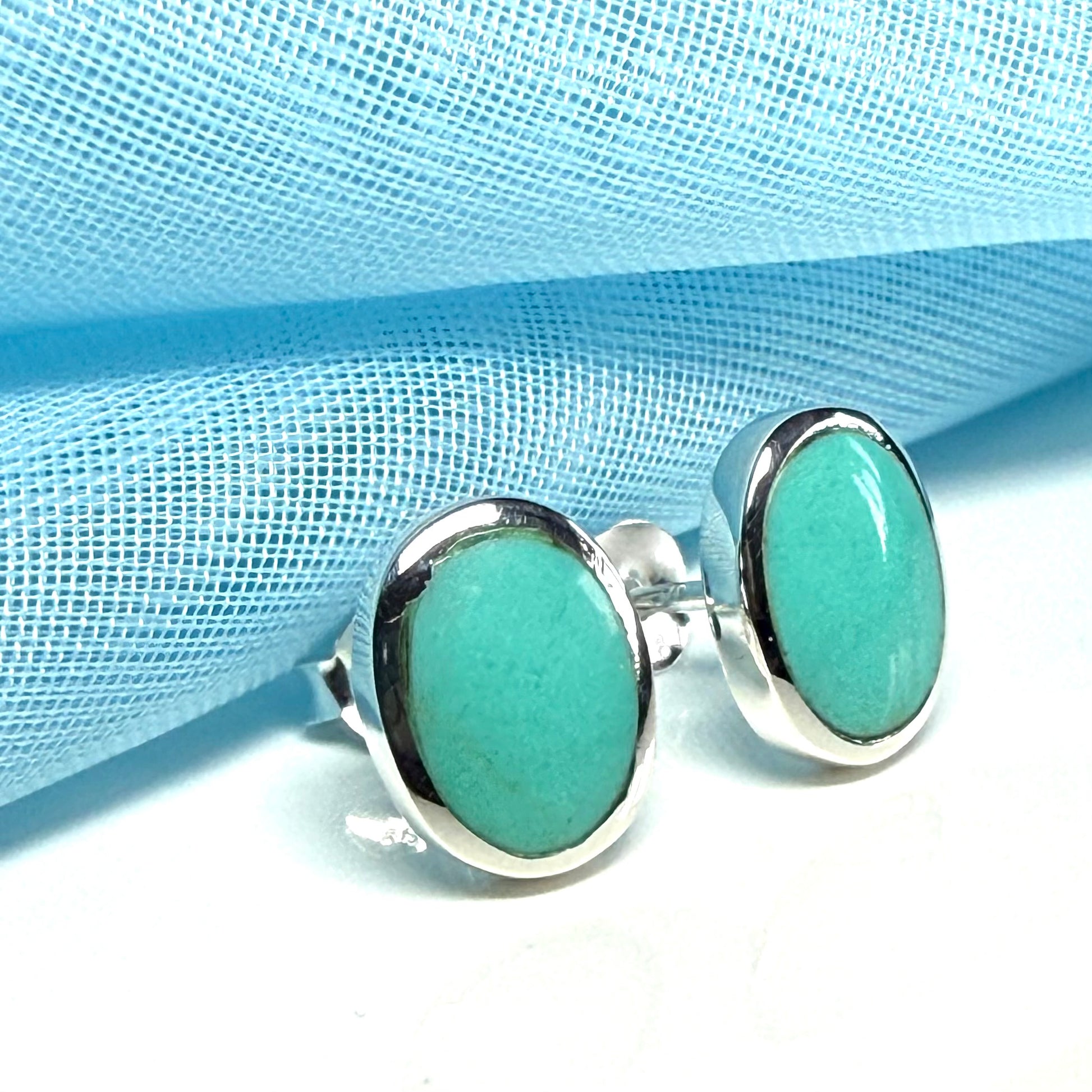 Blue sterling silver turquoise stud oval shaped earrings