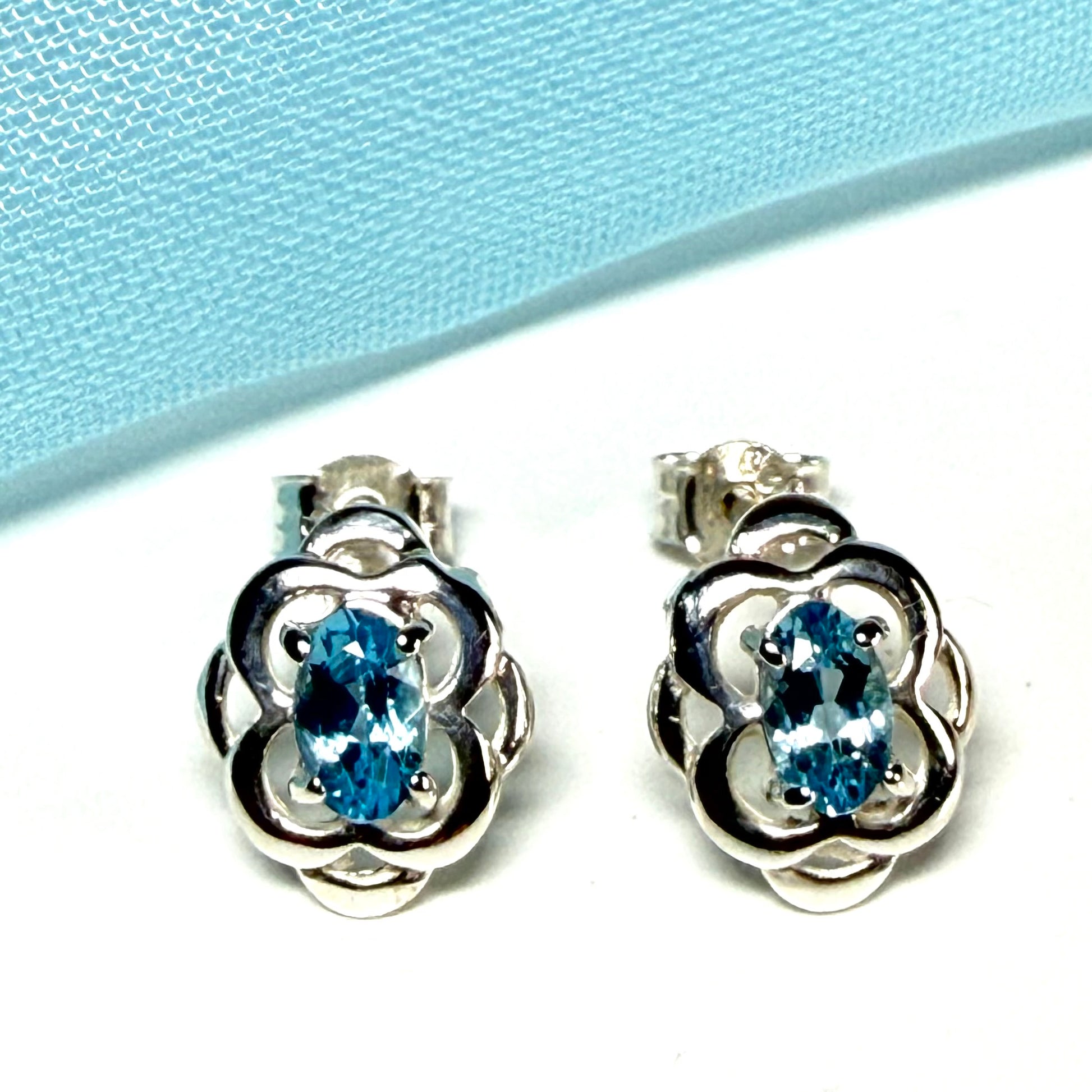 Blue topaz sterling silver oval Celtic stud earrings