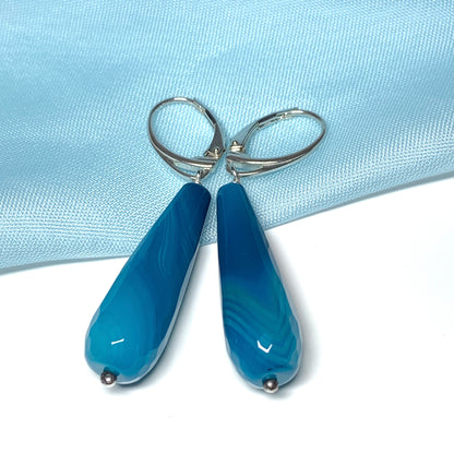 Blue long teardrop shaped agate drop earrings continental fastenings