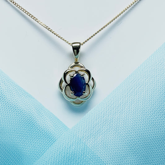 Blue oval sapphire yellow gold necklace