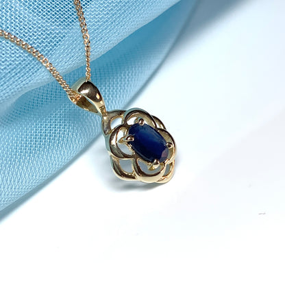 Blue oval sapphire yellow gold necklace