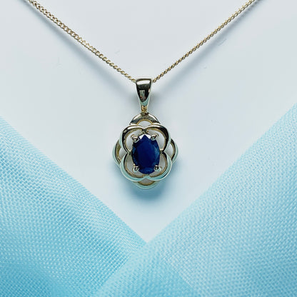 Blue oval sapphire yellow gold necklace