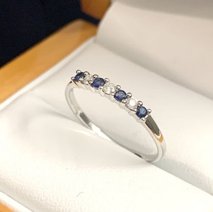 White Gold Blue Sapphire And Diamond Claw Set Eternity Ring