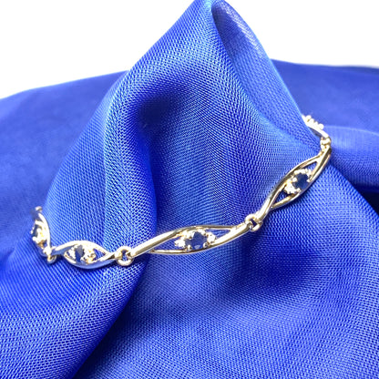 Blue sapphire and diamond yellow gold bracelet