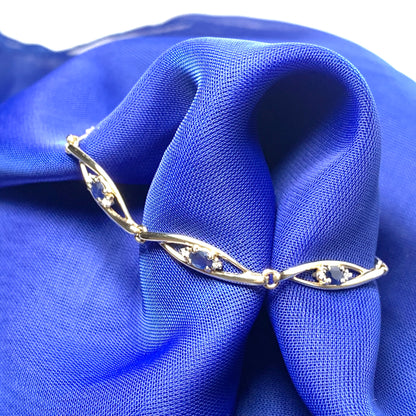 Blue sapphire and diamond yellow gold bracelet