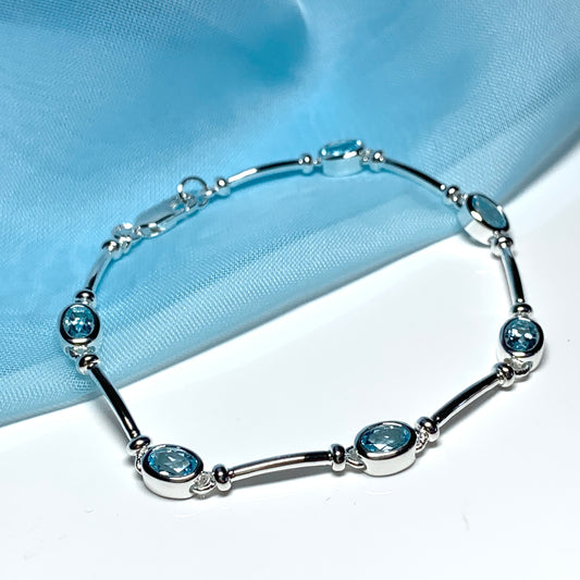 Blue topaz oval sterling silver bracelet