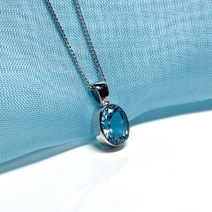 Blue topaz oval necklace white gold pendant