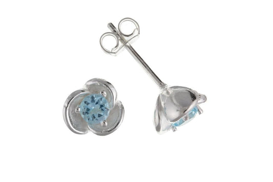 Blue topaz sterling silver opened flower stud earrings