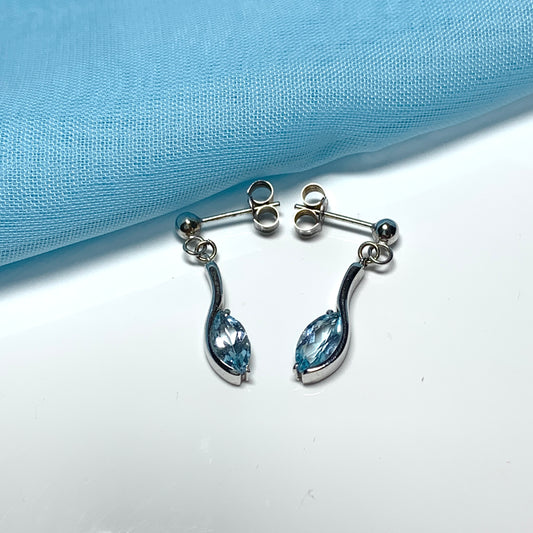 Blue topaz white gold marquise shaped fancy swirl drop earrings