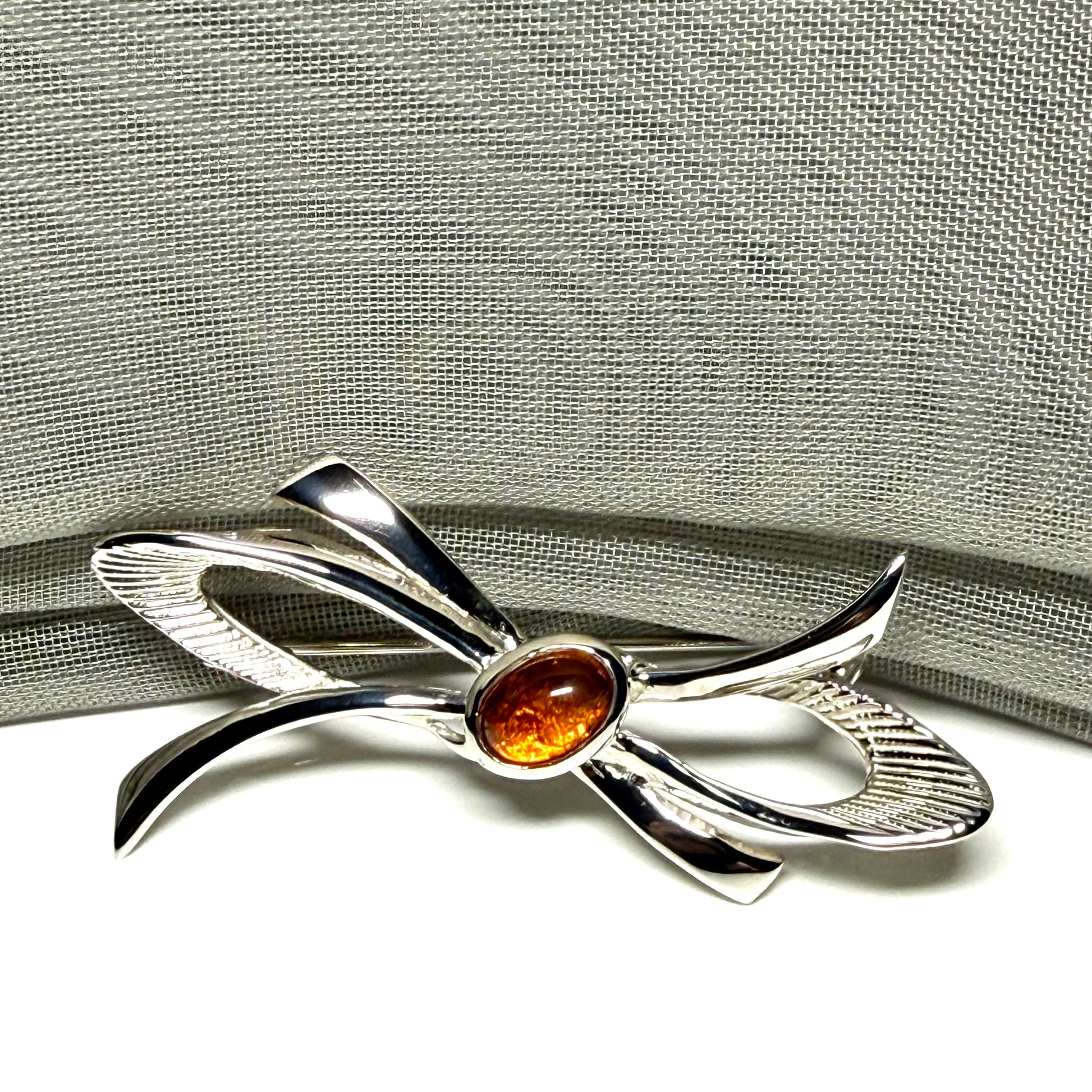 Bow Shaped Sterling silver real amber brooch
