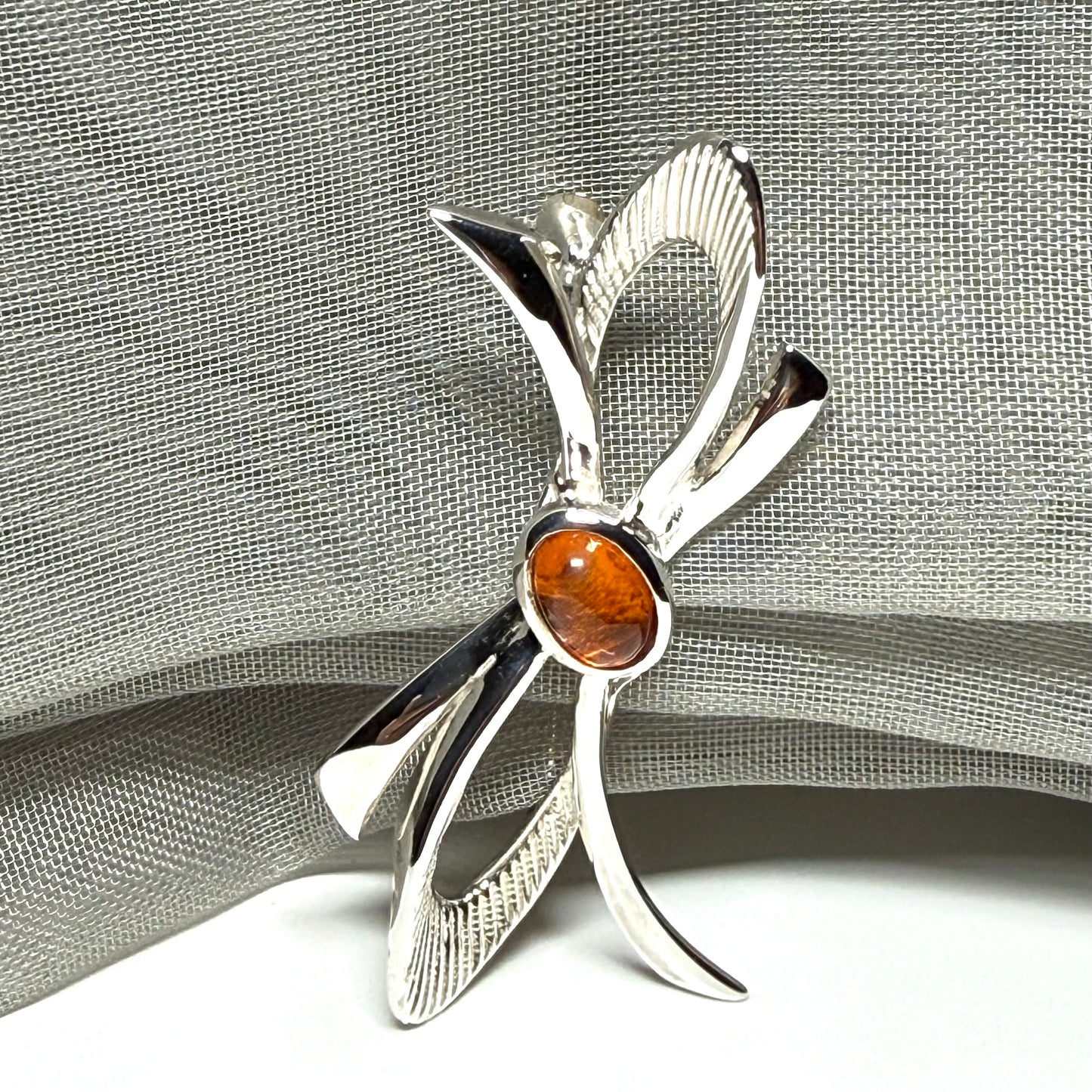 Bow Shaped Sterling silver real amber brooch