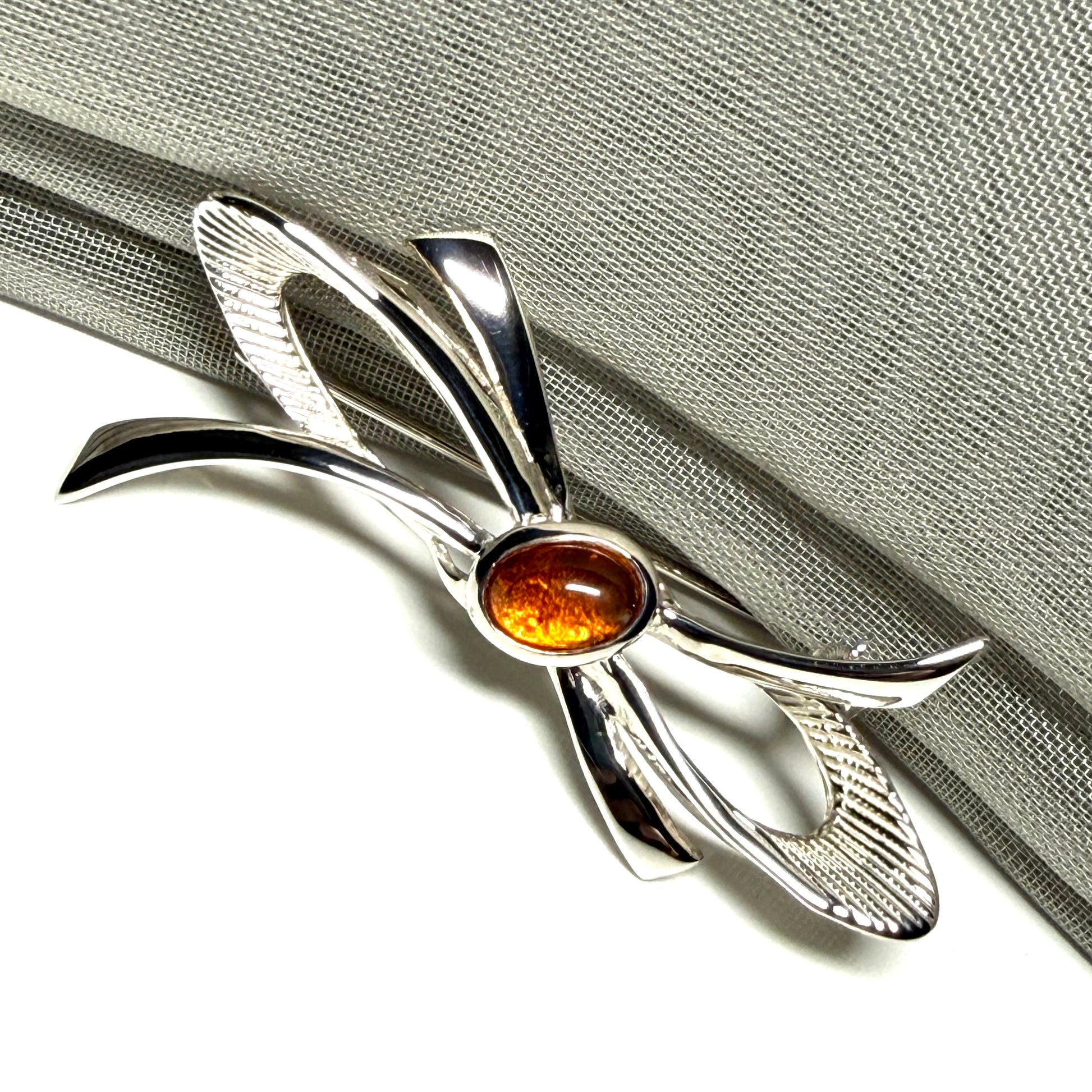 Bow Shaped Sterling silver real amber brooch