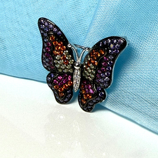 Butterfly brooch set with purple and multicoloured cubic zirconia stones