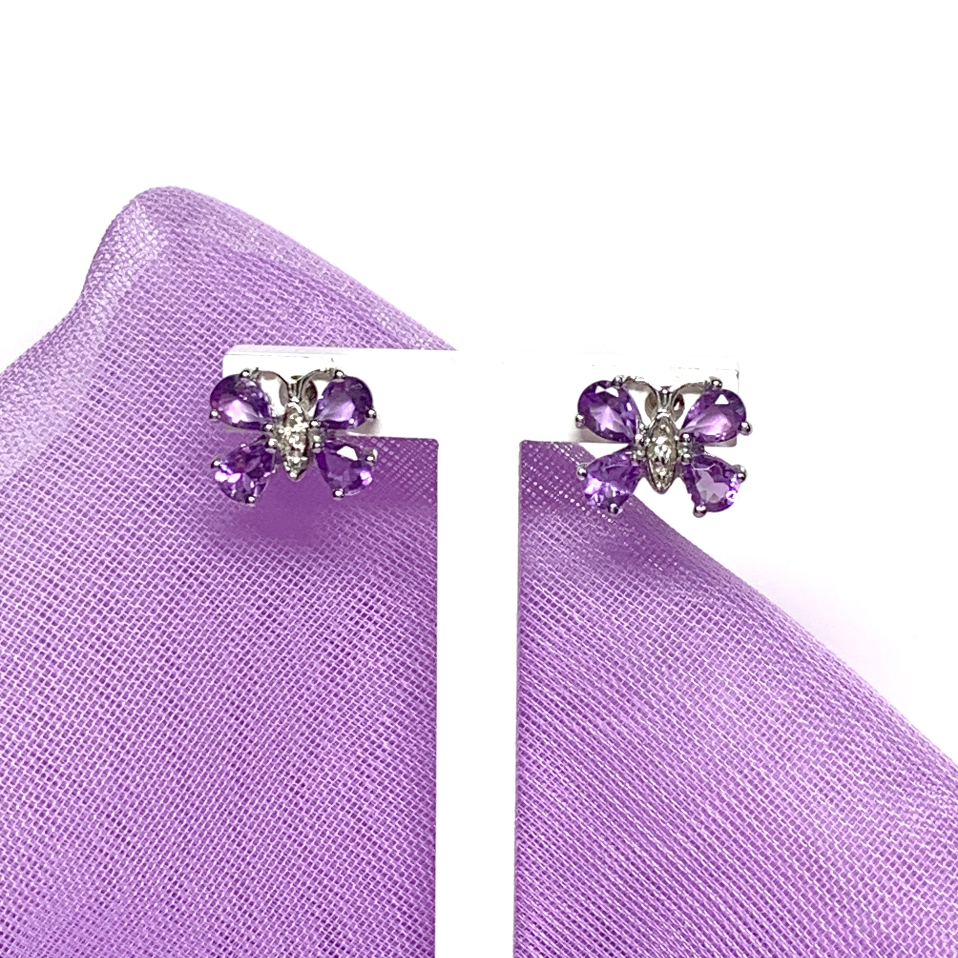 Butterfly shaped purple amethyst and diamond sterling silver stud earrings